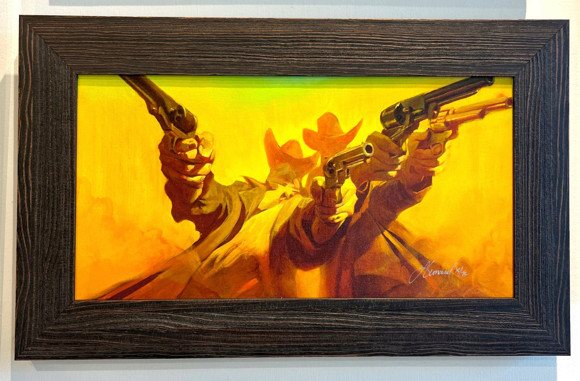 Gabe Leonard's artwork of two men holding two guns each pointing them at the audience. The background is bright yellow and smoky like. This is also custom framed in old styled barn wood.