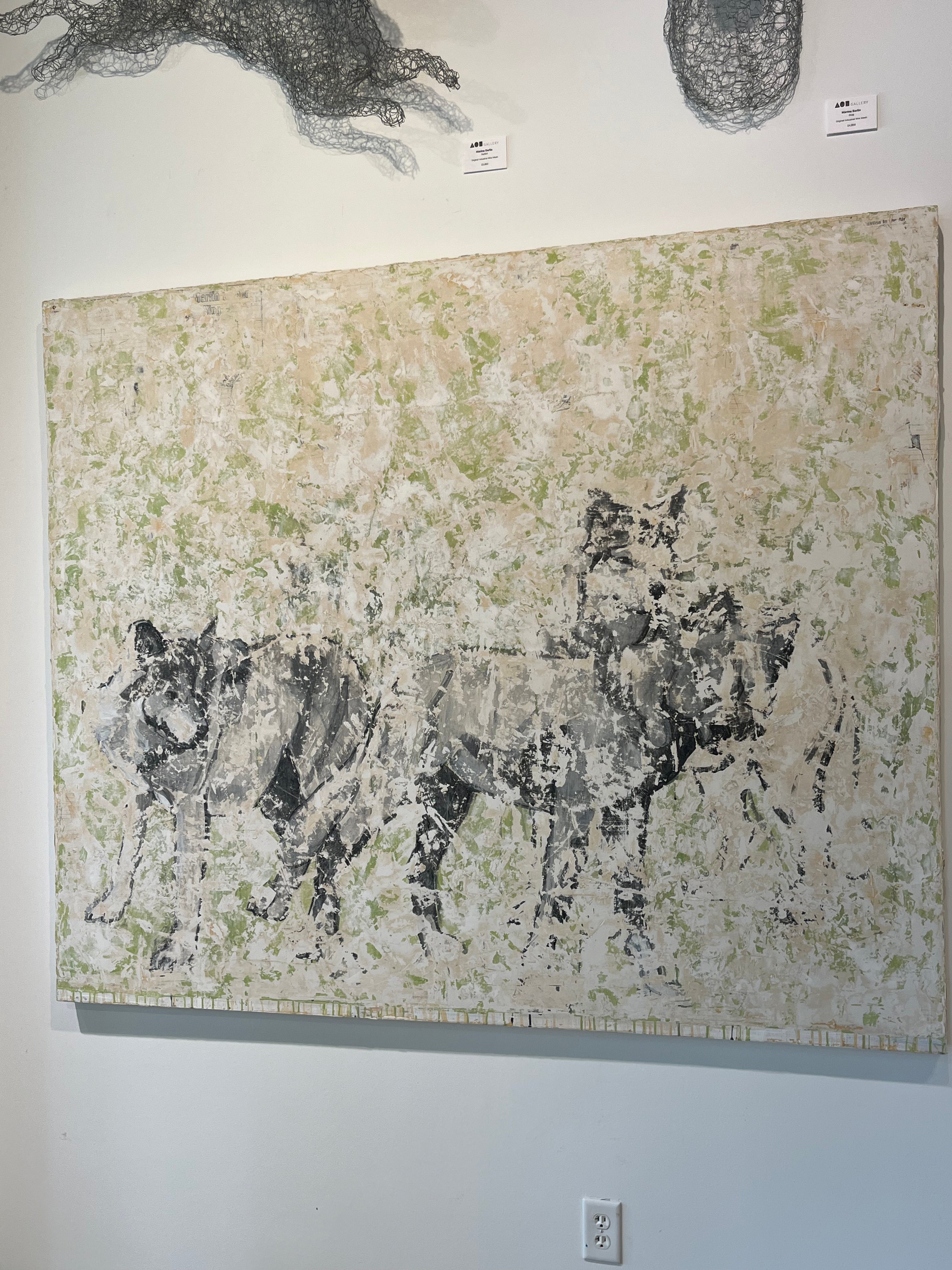 Nicole Charbonnet oversized original artwork of three greenwolves.