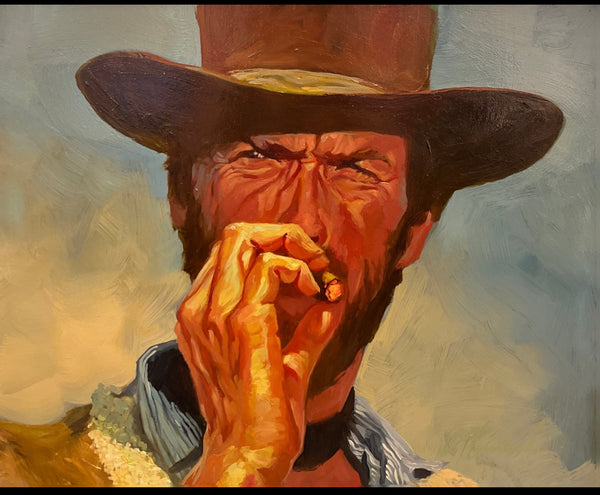 Gabe Leonard's painting of the actor Clint Eastwood wearing a cowboy hat smoking a cigar with his right hand. He is wearing a blue collared shirr and a brown cowboy hat. 